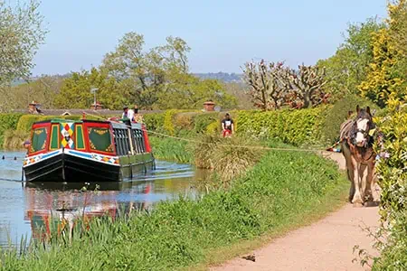 Narrowboat pulled by a horse